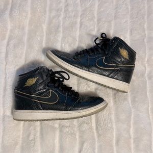 Air Jordan Nike high tops.